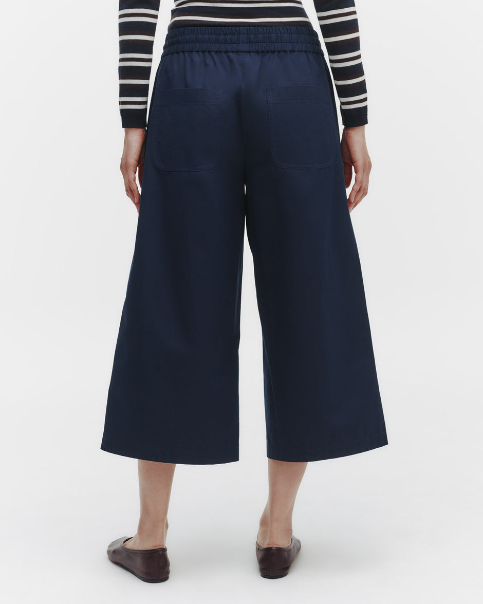 TWP Dark midnight Cropped Main Street Pant with Side Pleat in Cotton Poplin view 1