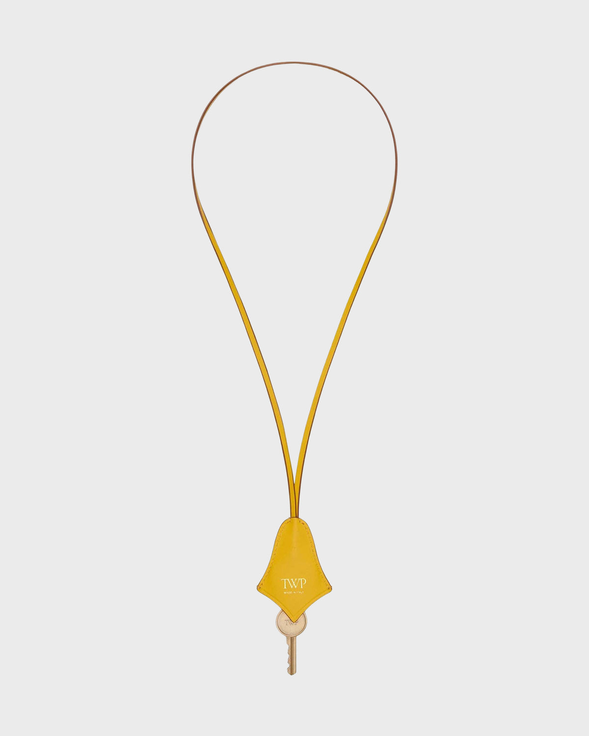 Soleil Yellow Leather Key Necklace with Gold-Tone Key - Full Length Flat Lay | TWP Clothing